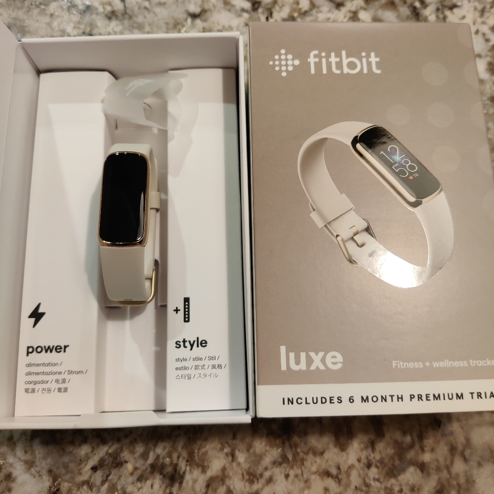 Fitbit luxe. New in box. Never been used. Taken out just to take pictures